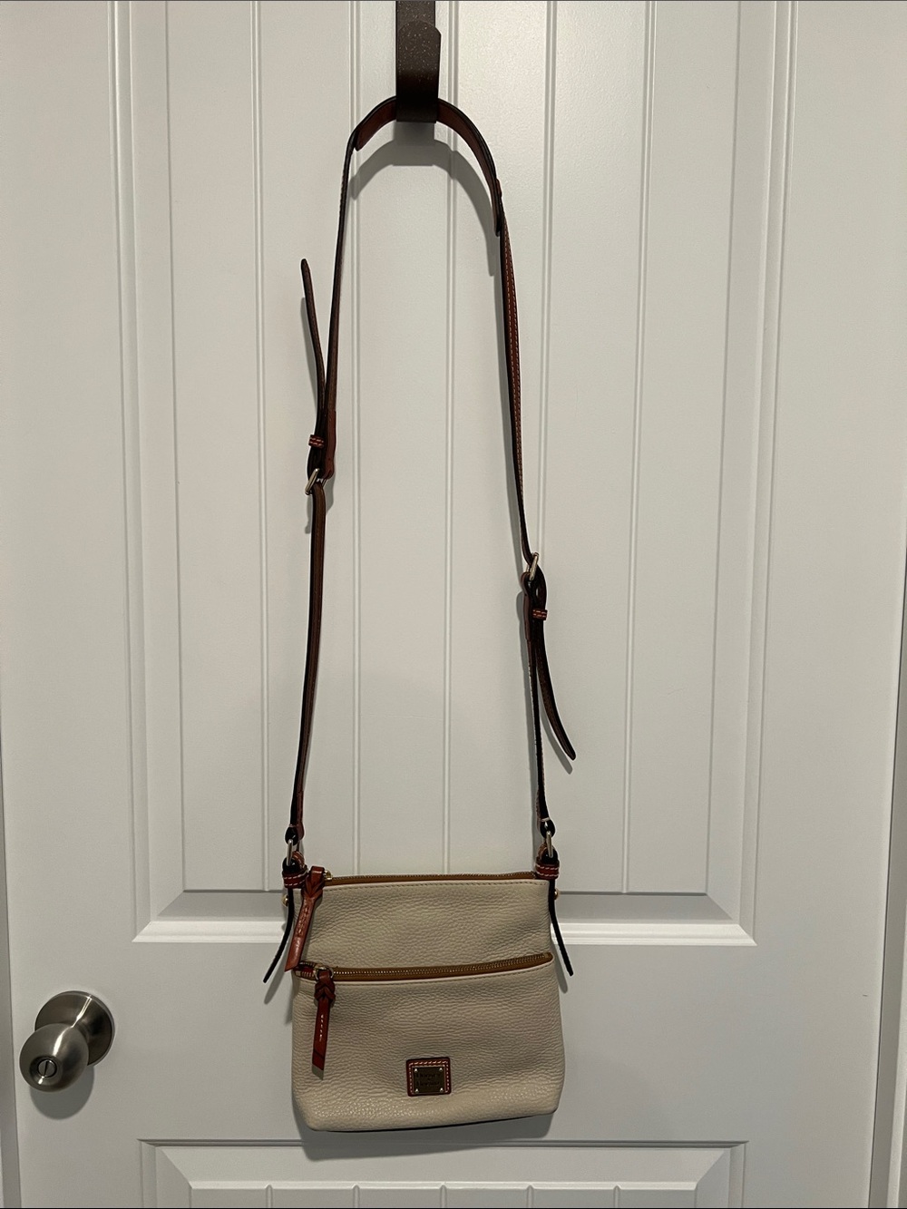 Dooney & Bourke Women’s Cream Pebbled Leather Crossbody with Brown Trim
